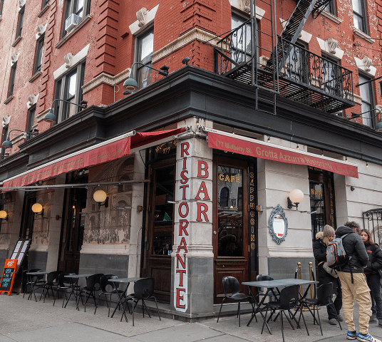 The corner of Mulberry and Broome: Grotta Azzurra ristorante with the fifth-floor walkup above